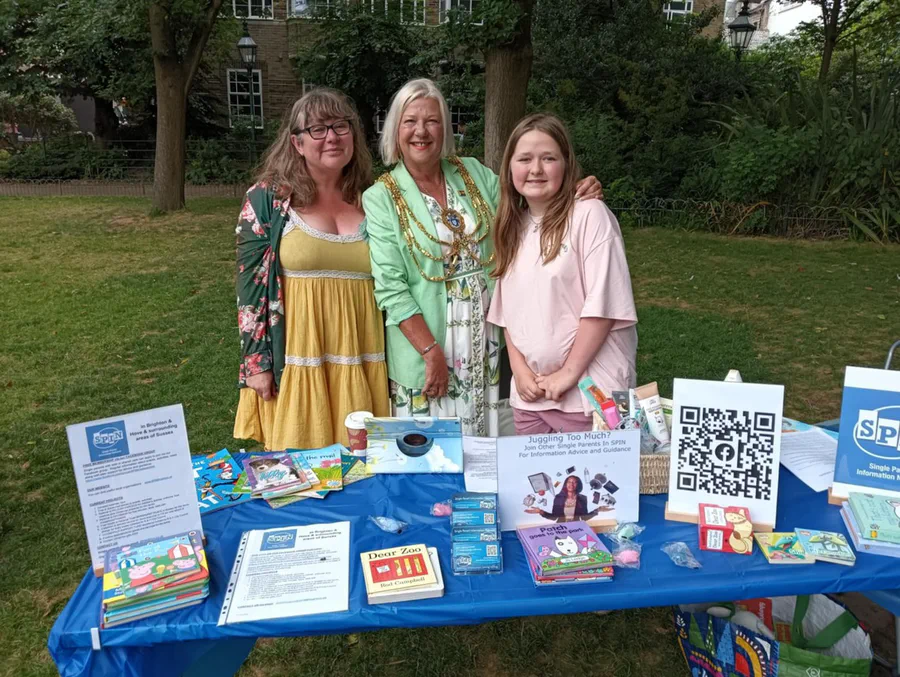 SPIN volunteers at the community charity day stall, 2025